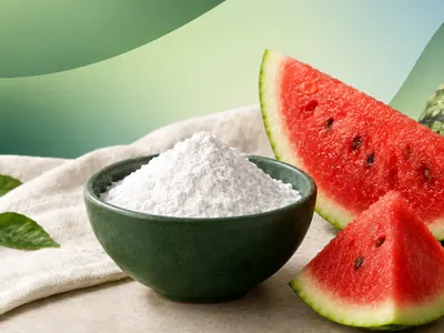 L-citrulline malate powder beside fresh watermelon slices